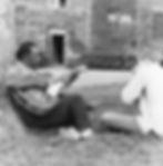 Big Joe Williams playing guitar with Rick Smith. Courtesy Rick Smith Personal Collection Copyright. on harmonica. Bard College, circa 1963