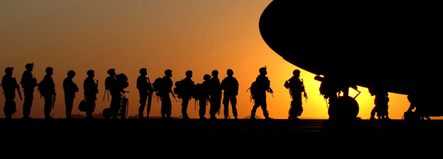 Soldiers waiting for airplane.png