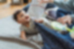 Young baby engaging with adults 