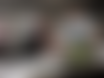 A young chef with autism preparing food in a professional kitchen