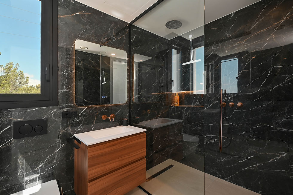 Luxury contemporary bathroom with Laurent by Saloni black porcelain walls and walnut vanity in Project 030