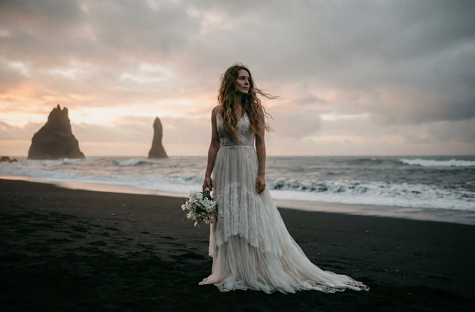 Reynisfjara Beach Iceland destination elopement inspiration featuring black sand, basalt cliffs, and an intimate, cinematic elopement atmosphere