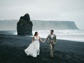 Reynisfjara Beach Iceland destination elopement inspiration featuring black sand, basalt cliffs, and an intimate, cinematic elopement atmosphere
