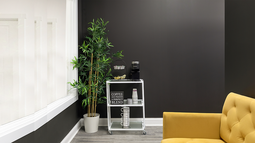 Taylor'd Cosmetology School waiting area with tea and coffee machine for clients and guests.