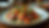 Close-up view of a beautifully arranged plate of food showcasing local ingredients