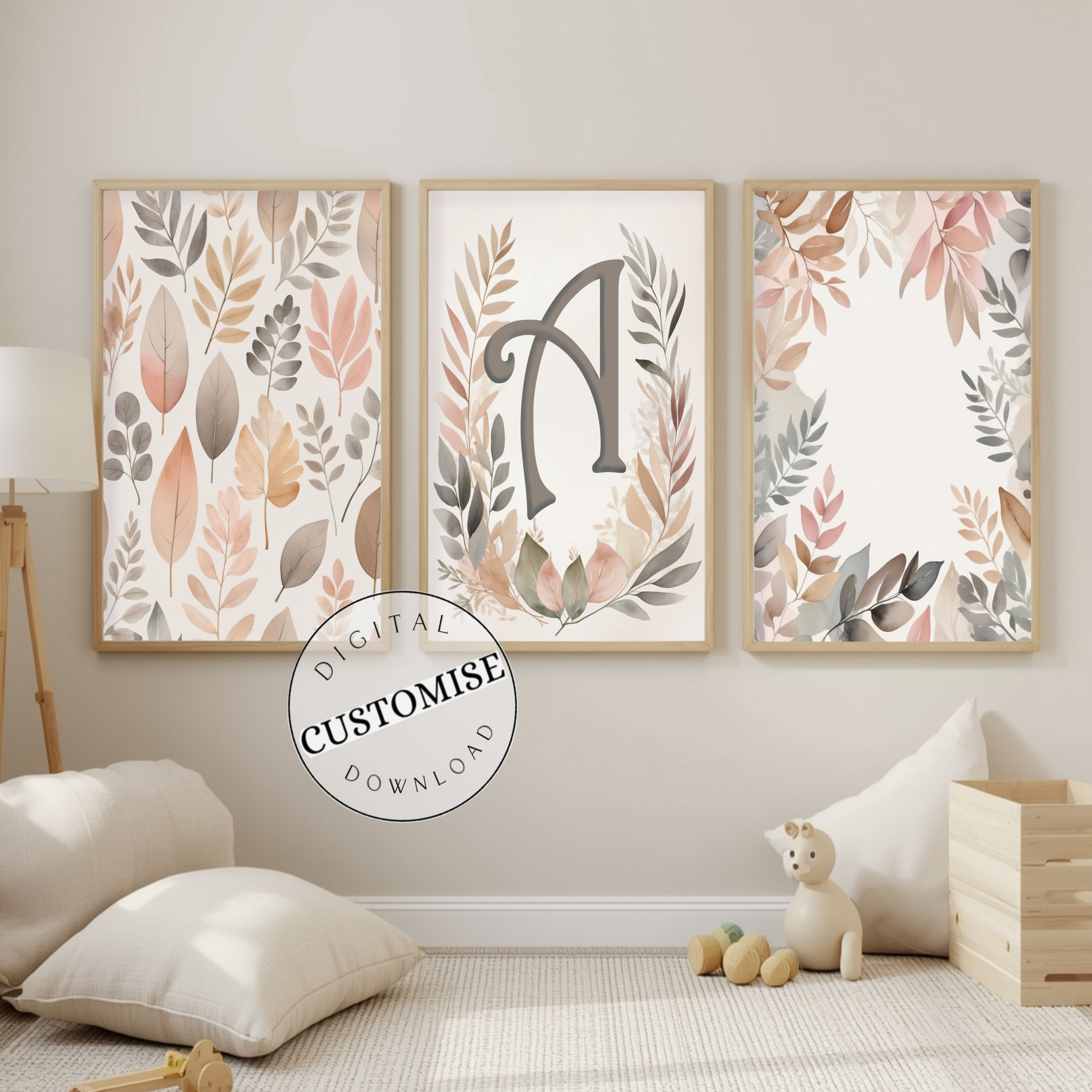 Three framed custom botanical leaf prints hanging on a neutral nursery wall,  two leaf patterns and one personalised initial