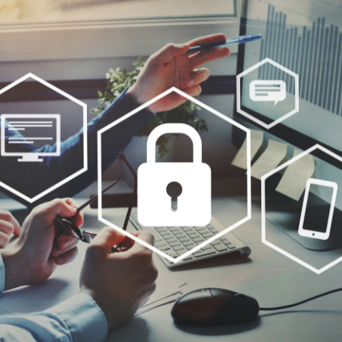 People working on a cybersecurity threat in an office environment