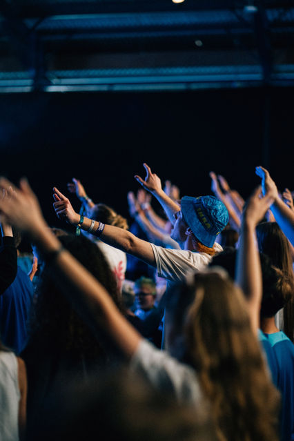 Boy worshipping in IKEA hat