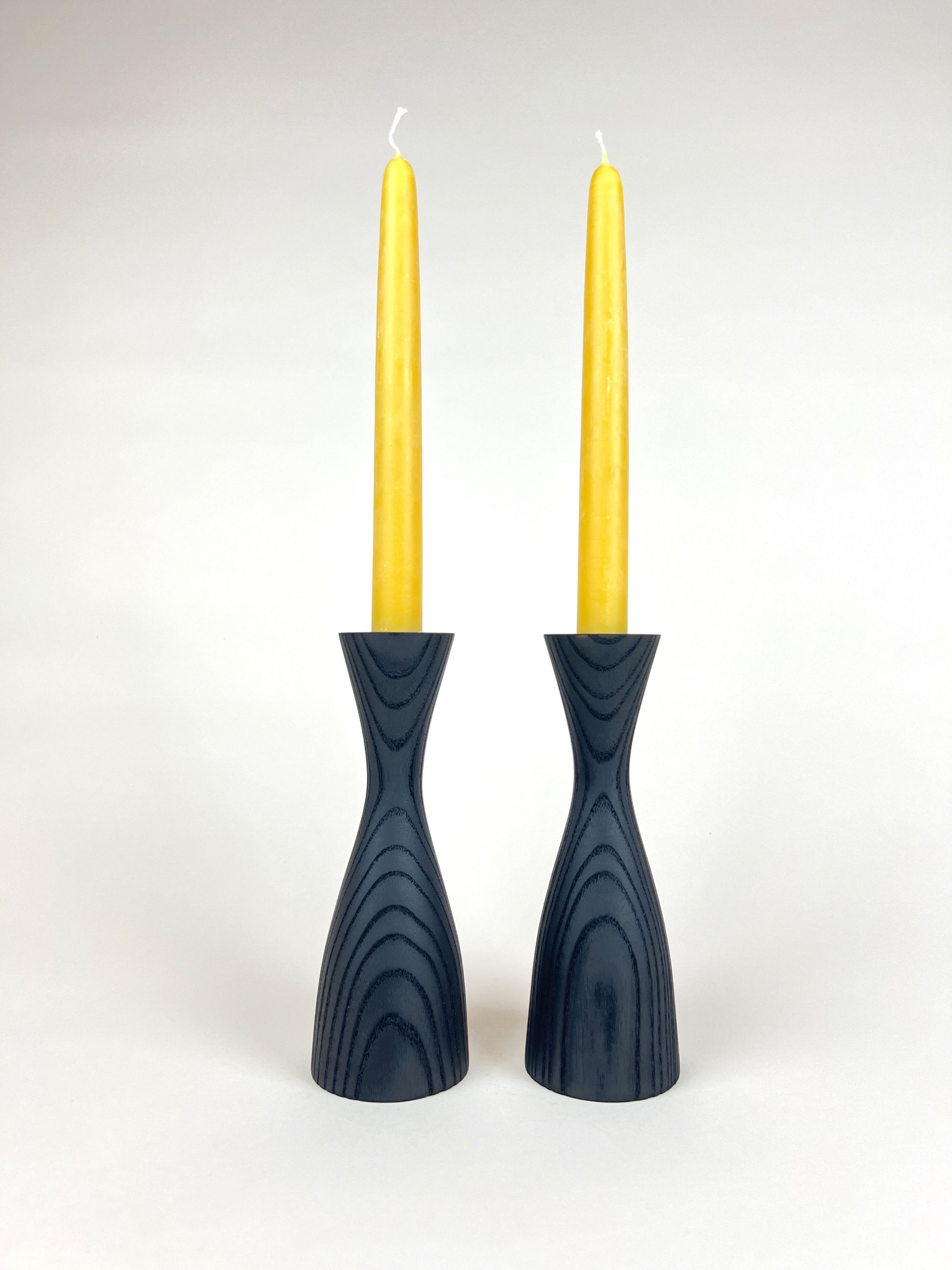 Pear Shaped Taper candle holders in black charred, using the Japanese Shou Sugi Ban method of burning wood
