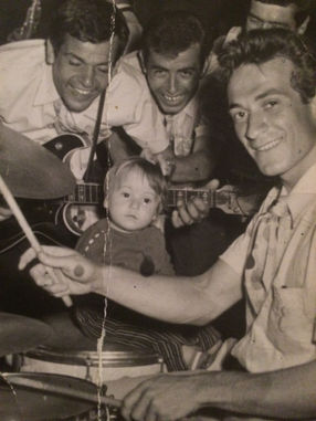 My dad did his military service as a drummer in the officers' club in Turkey. In this picture I am about just about 2 years old. Mom and I were in Istanbul and every now and then we could visit him at gigs. 