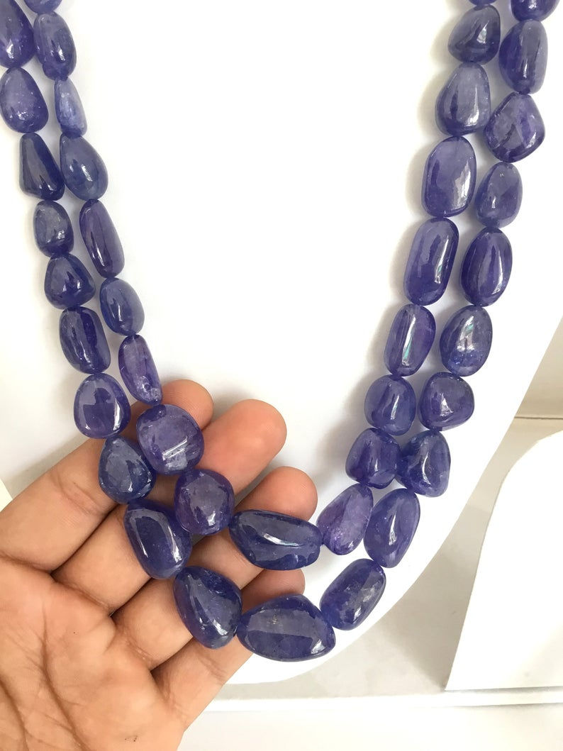 الصورة المصغرة: Tanzanite Tumbled Tanzanite Plain Tumbled Tanzanite Natural Gemstone