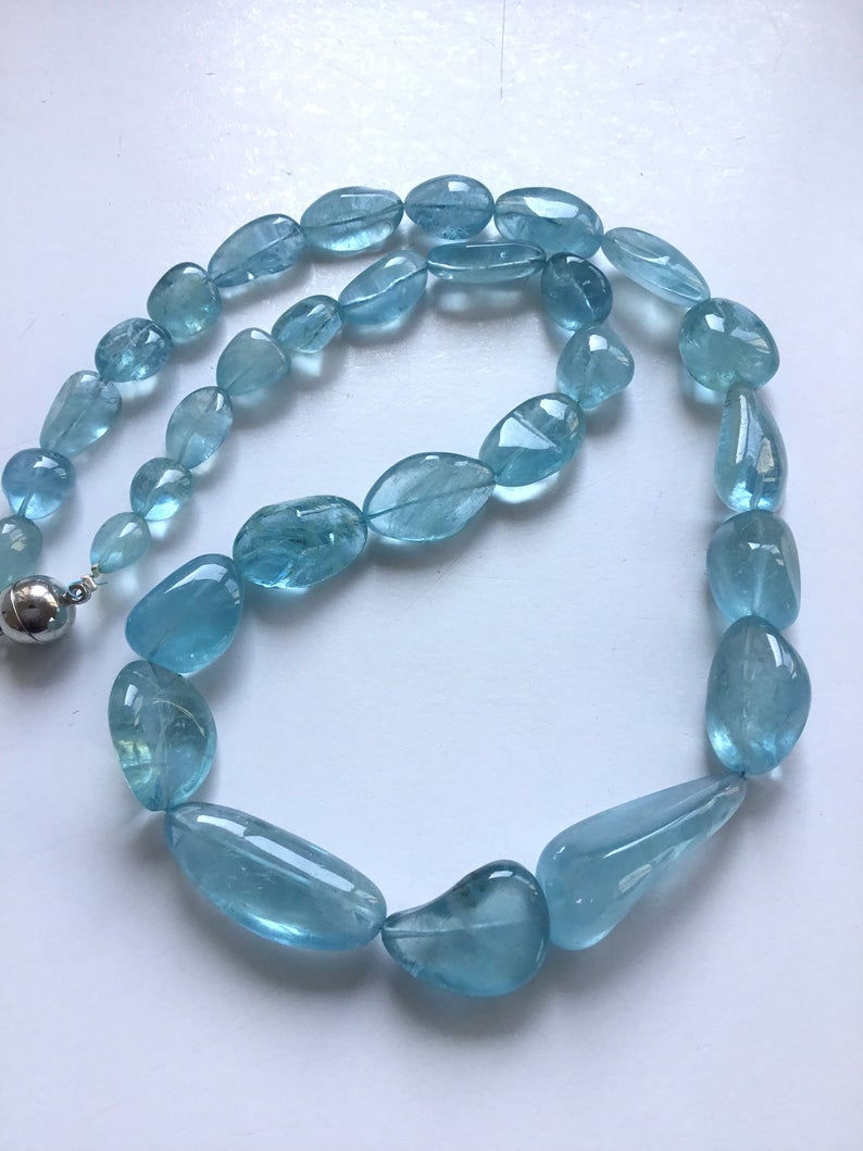 Thumbnail: Aquamarine Plain Smooth Tumble 1 Strand Natural Gemstone