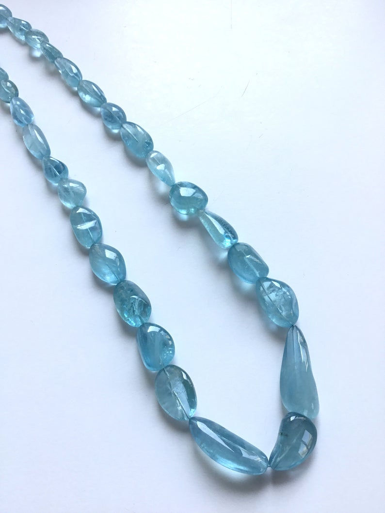 Thumbnail: Aquamarine Plain Smooth Tumble 1 Strand Natural Gemstone