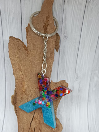 llavero letra x letrax inicial nombre resina epoxi resinaepoxi azul círculos multicolor hechoamano hechoconcariño hechoconamor handmade detalles regalospersonalizados regalosunicos regalosoriginales nereida nereidaweb nereidahechoamano