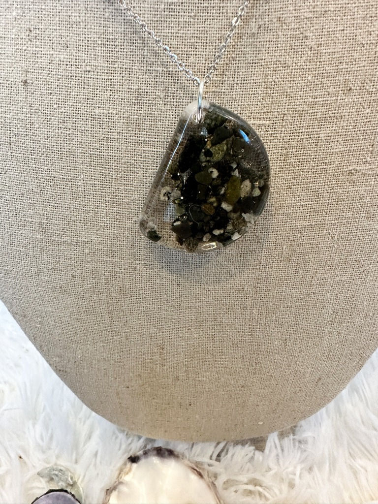 A necklace with beach pebbles handpicked from the Pacific Shoreline on Vancouver Island