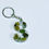 Thumbnail: Letter S epoxy resin keychain infused with beach pebbles
