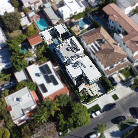 Aerial drone photograph revealing the expansive layout and scenic location of a Los Angeles property, captured from above by Top Estate Media.