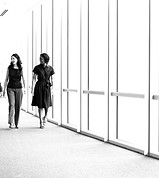 Businesswomen Walking in Hallway_edited.