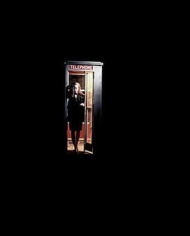 Woman in Telephone Booth