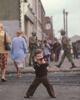 Toddler Holding Fake Gun