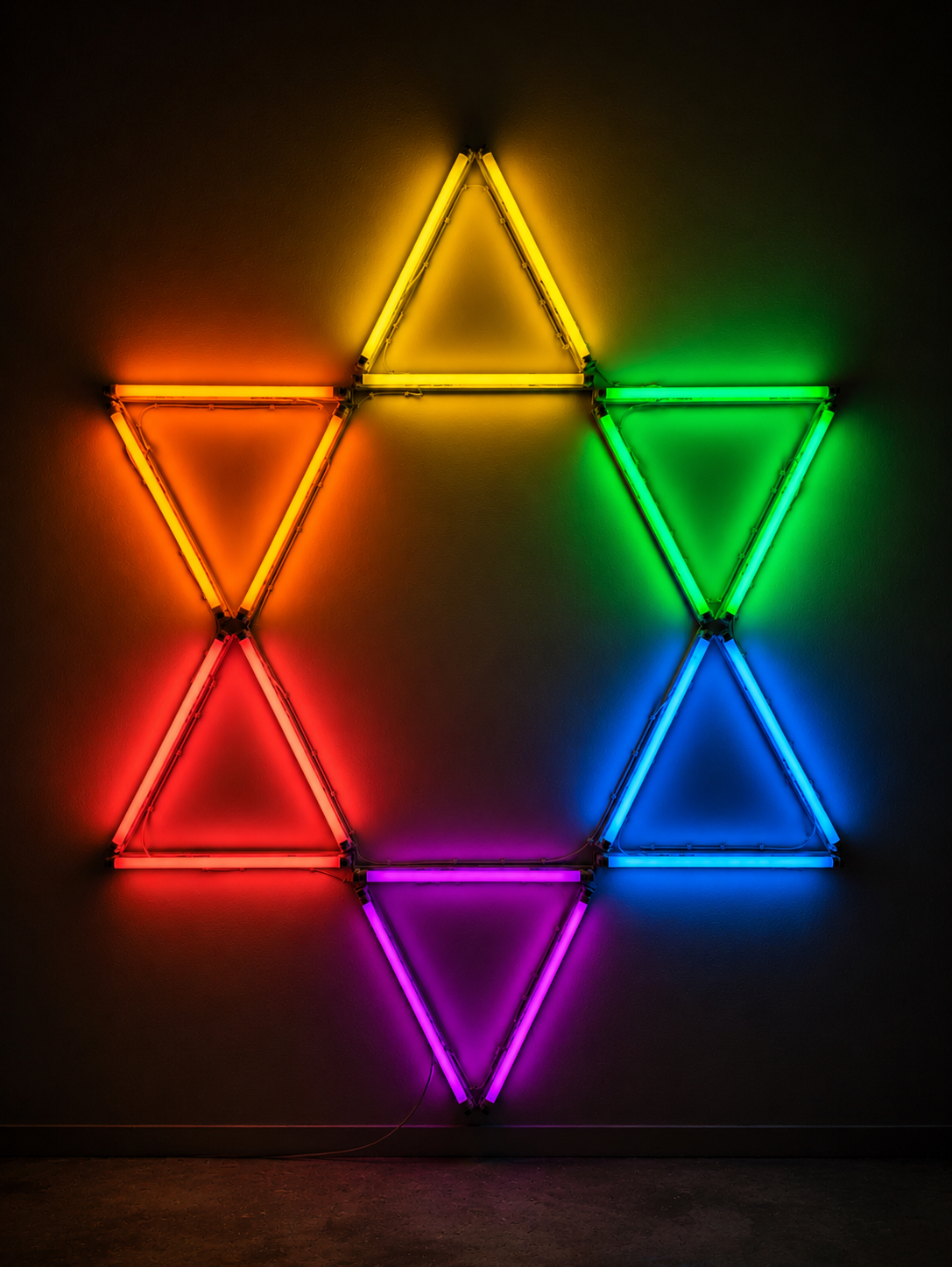 A colour star made of triangles of multicoloured fluorescent light