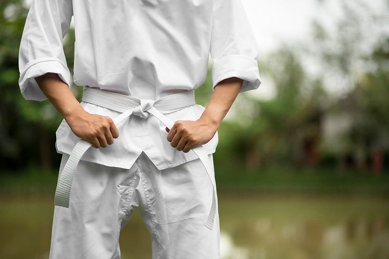 man-training-taekwondo-outdoors-nature_23-2149908501.jpg