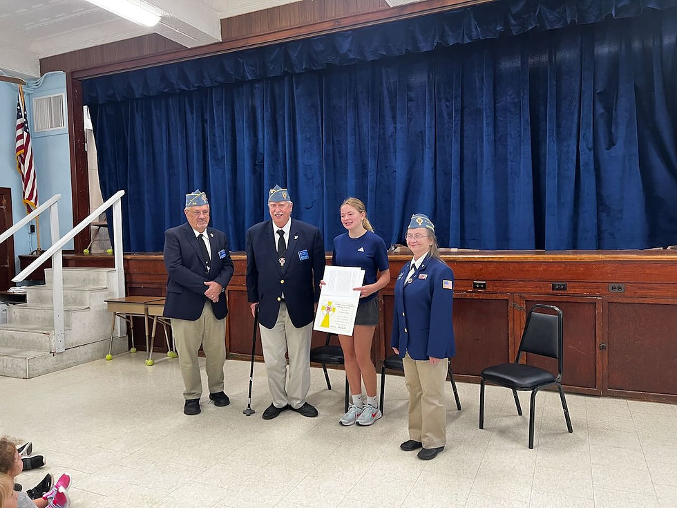 Presenting the check and certificate to the winner of the national  CWV essay contest to Eve Schleeper