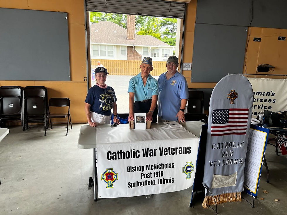 Rose, Dan and Charlie with our table at the Veterans Resource Fair