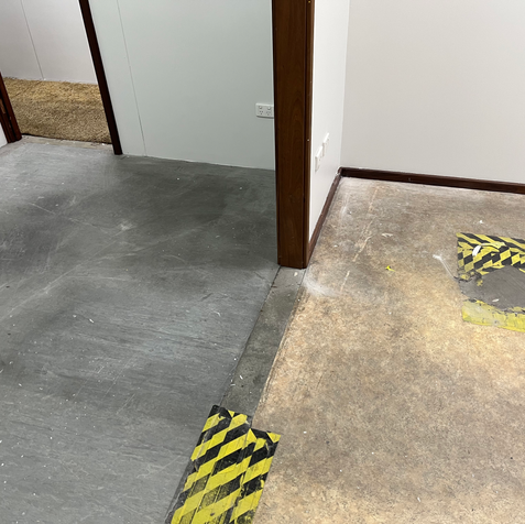 commercial vinyl and carpet in hallway uplift