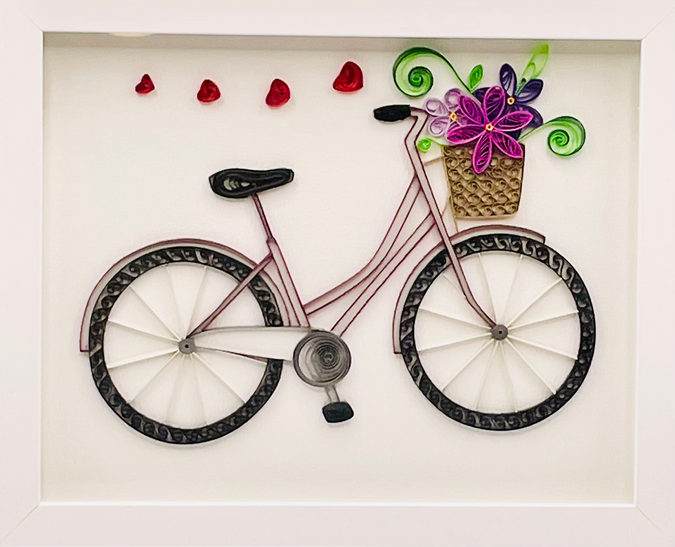 Quilled bicycle with flower basket