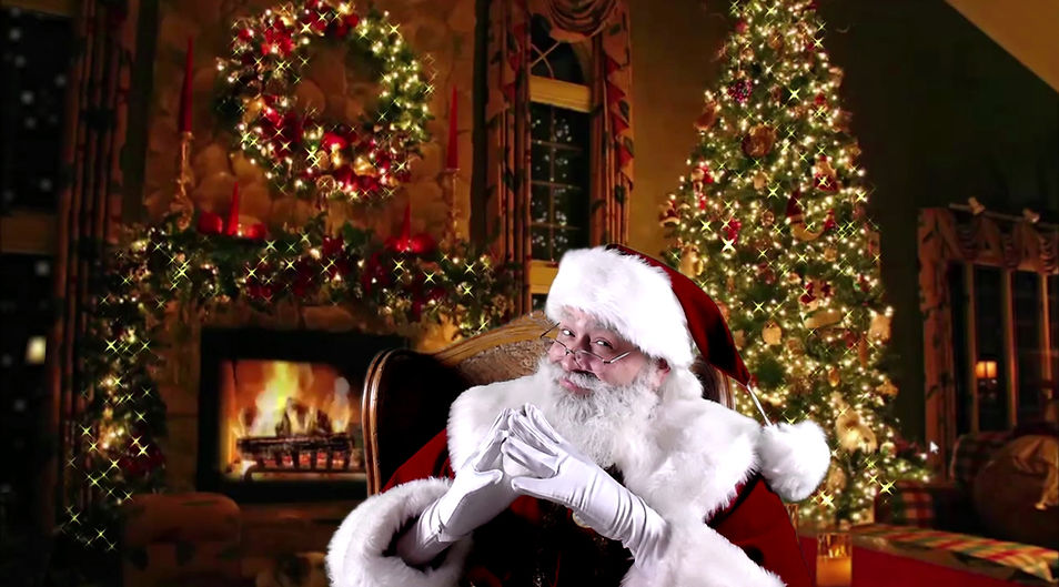 Santa Steve sitting in his North Pole home checking to see if you're Naughty or Nice