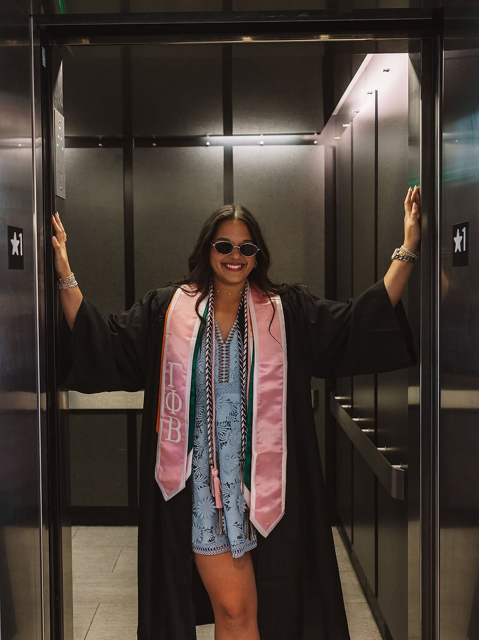 Taylor McCain posing for her graduation photos.