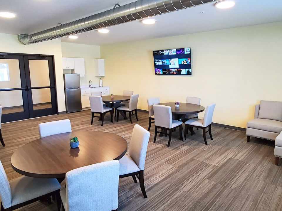 community room at uptown village apartments