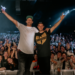 MC Fenicx and DJ Dosschy with festival crowd music tomorrowland