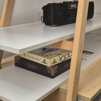 Board games on a shelf at Impact Hub Belgrade
