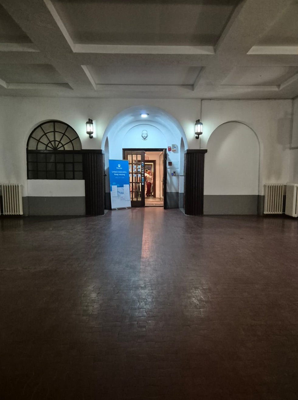 A courtyard showing the entrance to Impact Hub Belgrade
