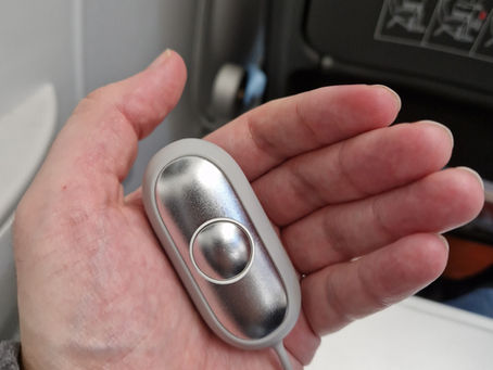 The CalmCarry device in a male person's hand