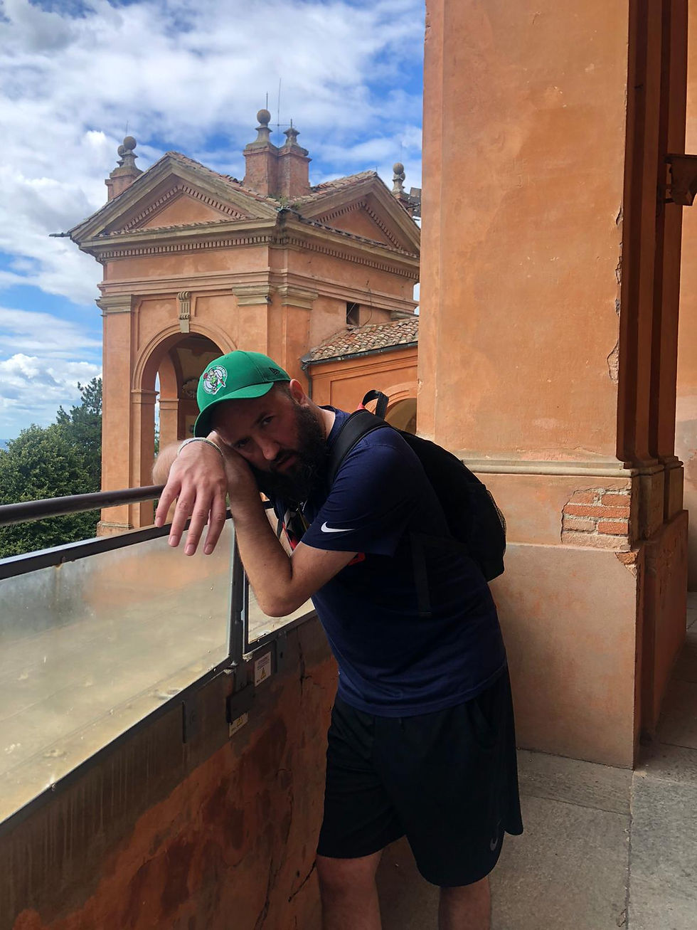 Man at top of San Luca in Bologna