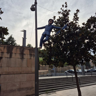A figure on a pole in Lleida, Spain