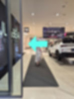 An added arrow showing the way to the row of ATMs in Mepas Mall, Mostar, Bosnia