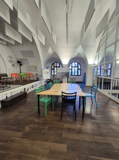 A wide shot of the interior of the gallery at Impact Hub Belgrade