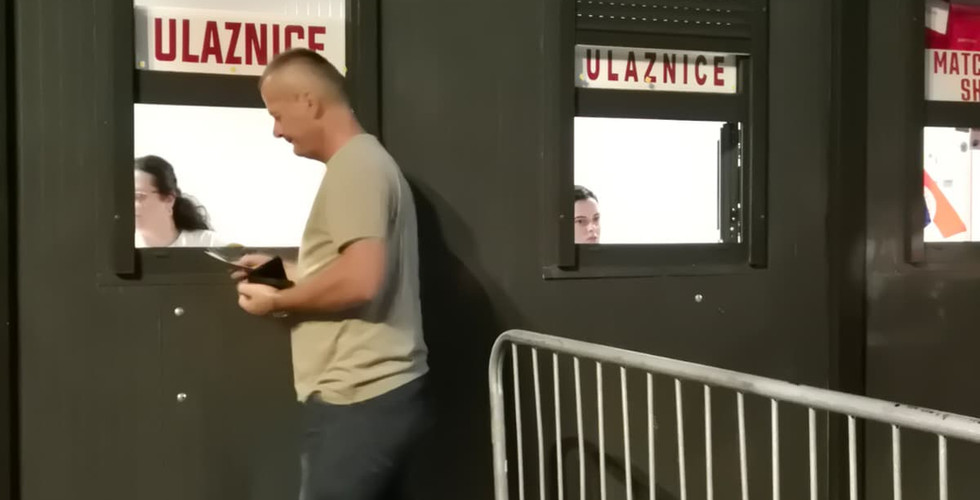 A person buying tickets at the Zrinjski Mostar stadium