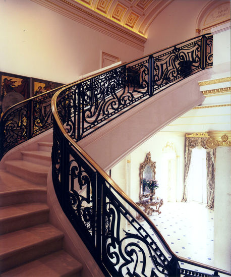 Fleur de Lys is a prestigious estate in Holmby Hills, Los Angeles, inspired by France's Vaux le Vicomte. Completed in 2002, this 45,000-square-foot mansion, designed by architect Richardson Robertson III, features 12 bedrooms, 15 bathrooms, a ballroom, a 50-seat theater, and expansive formal gardens. Gregory Mauge, an expert in 17th to 19th-century decorative arts, played a crucial role in curating the estate's art collection, ensuring authenticity and historical accuracy. His involvement included acquiring and appraising rare antiques, elevating the estate's grandeur.