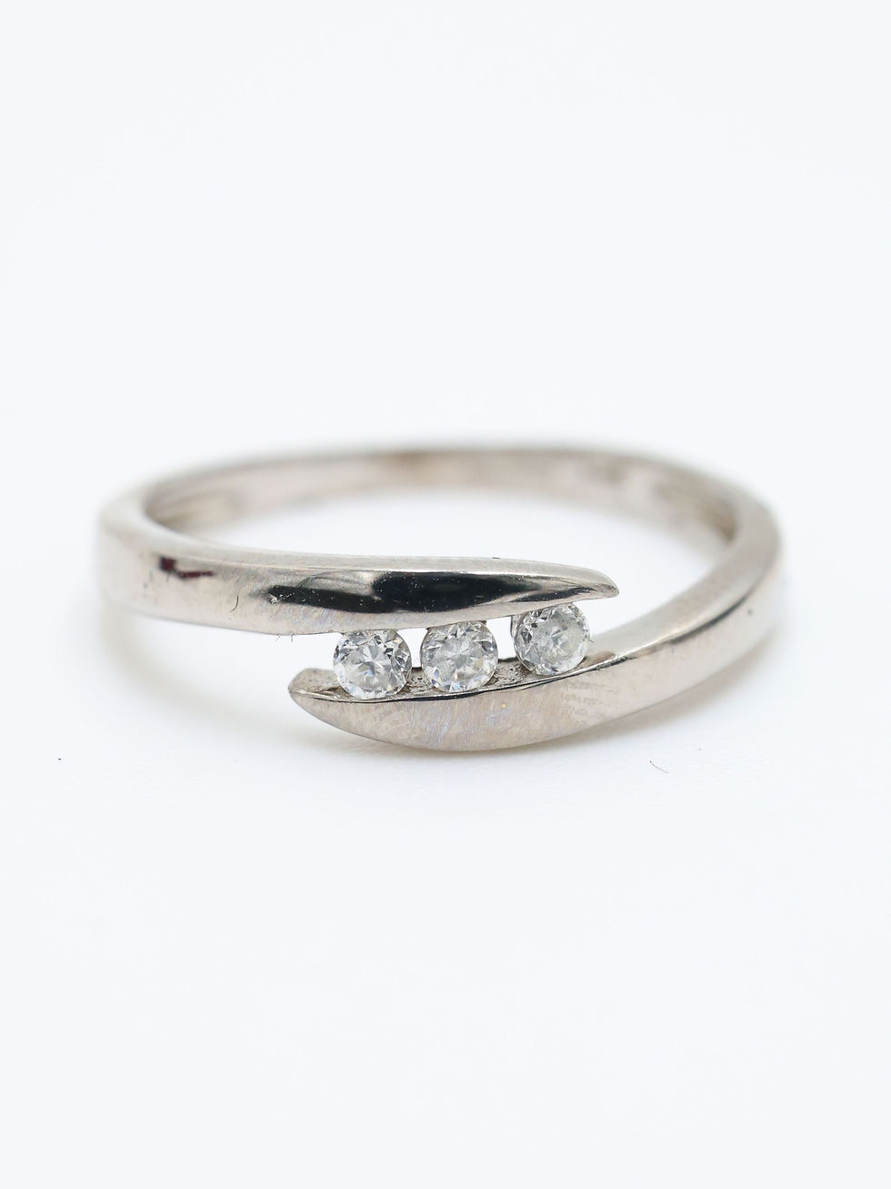 Thumbnail: 9ct White Gold Twist CZ Trilogy Band Ring
