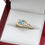 Thumbnail: 9ct Yellow Gold Twist Set Blue Topaz & Diamond Ring