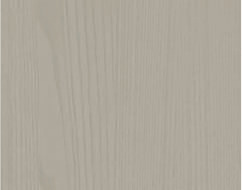 A sand dune in a desert with a beige sky