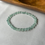 Thumbnail: Icy White and Green Flat Beads Bracelet