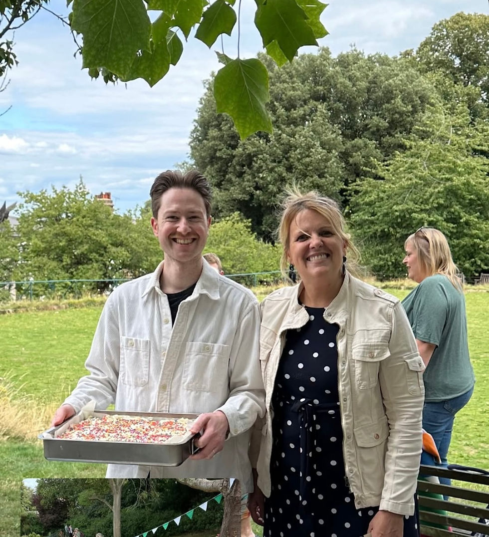 Basement Bakehouse founders Liam & Andrea serving cake to the community