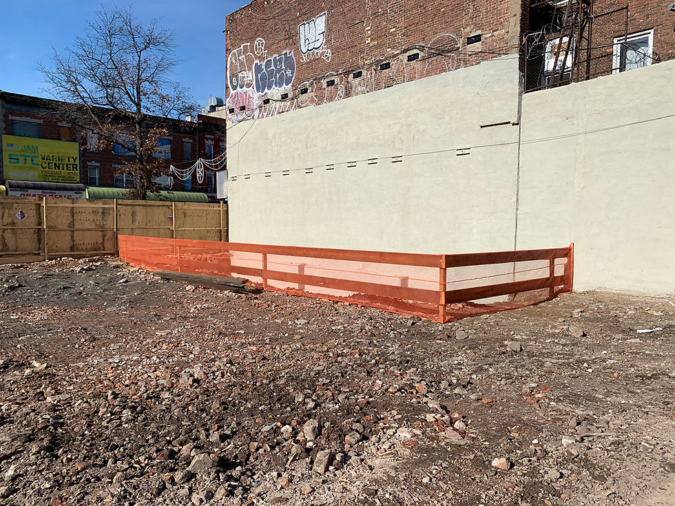 Thumbnail: Cleared construction site with safety barrier