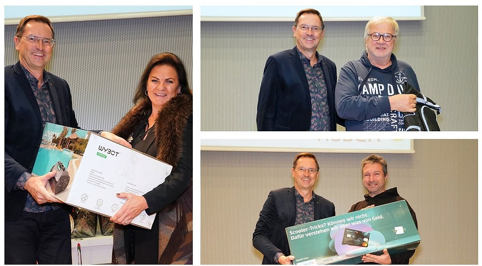 Robert Reif mit den Gewinnern der Tombola Hauptpreise